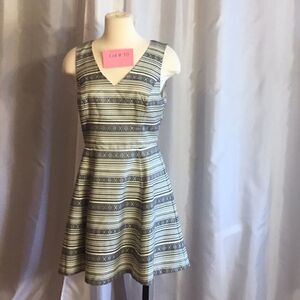 Open back dress with statement silver zipper, skater style skirt in size medium